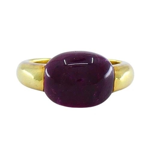 VINTAGE TOURMALINE RING 18K GOLD ESTATE JEWELRY: VINTAGE TOURMALINE RING 18K GOLD ESTATE JEWELRY CIRCA: 1990’s MATERIALS: 18k Gold GEMSTONE: Tourmaline WEIGHT: 9.3 Grams MEASUREMENTS: Stone - 3/8" x 1/2" RING SIZE: 6.75 HALLMARKS: 18K ITEM DETAILS
