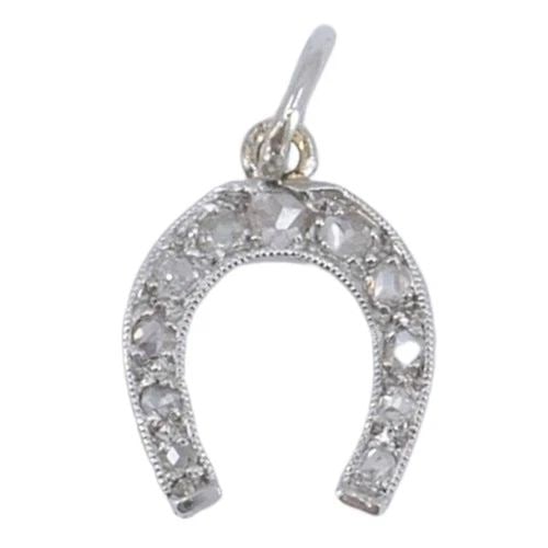 EDWARDIAN PLATINUM ROSE CUT DIAMOND HORSESHOE PENDANT: Edwardian Platinum Rose Cut Diamond Horseshoe Pendant KL ITO This antique platinum rose cut diamond horseshoe charm dates to the Edwardian period, circa 1910 to 1920. The design features a classic hor