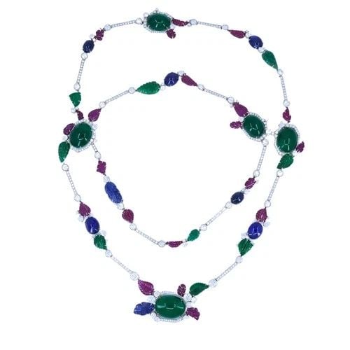 SABBADINI TUTTI-FRUTTI NECKLACE 18K WHITE GOLD CARVED GEMSTONES: SABBADINI TUTTI-FRUTTI NECKLACE 18K WHITE GOLD CARVED GEMSTONES VK ETOO SABBADINI Ruby Sapphire Emerald Diamond 18 karat White Gold Necklace A Sabbadini tutti-frutti design necklace, crafted in 18k wh