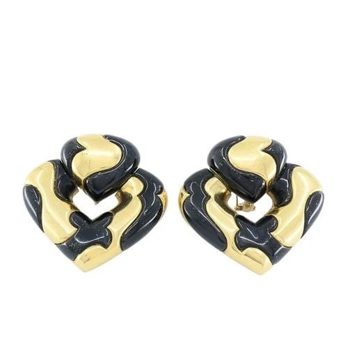 MARINA B 18K GOLD BLACK ENAMEL HEART EARRINGS VINTAGE ITALIAN DESIGNER CLIP-ONS: MARINA B 18K GOLD BLACK ENAMEL HEART EARRINGS VINTAGE ITALIAN DESIGNER CLIP-ONS DESIGNER Marina B CIRCA 1987 MATERIALS 18K Gold, Enamel WEIGHT 49.2 Grams MEASUREMENT 1 3/8" x 1 3/8" x 5/16" HALLMARKS 