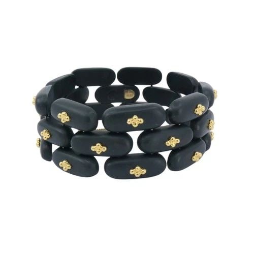 VINTAGE ANGELA CUMMINGS BRACELET GOLD BLACK JADE: VINTAGE ANGELA CUMMINGS BRACELET GOLD BLACK JADE NS EOOO Vintage Angela Cummings Bracelet Gold Black Jade A vintage Angela Cummings bracelet made of black jade and 18k gold. The bracelet is composed o