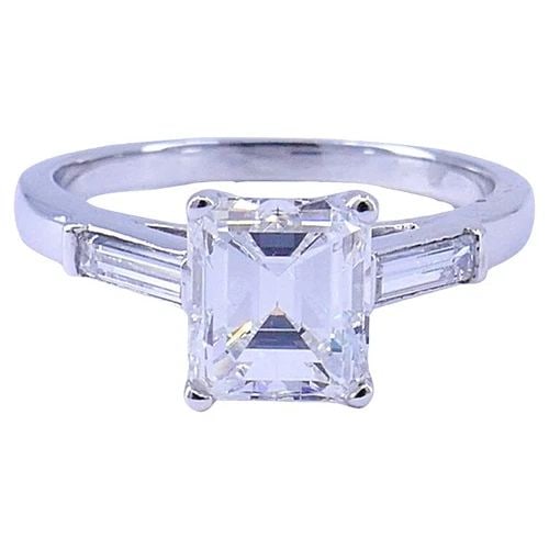 1.27-CT EMERALD CUT E VS2 GIA DIAMOND PLATINUM SOLITAIRE RING ESTATE JEWELRY: 1.27-CT F VS2 GIA DIAMOND PLATINUM SOLITAIRE RING ESTATE JEWELRY 1.27-CT F VS2 GIA DIAMOND PLATINUM SOLITAIRE RING ESTATE JEWELRY 1.27-carat Diamond Platinum Engagement Ring A diamond solitaire with a