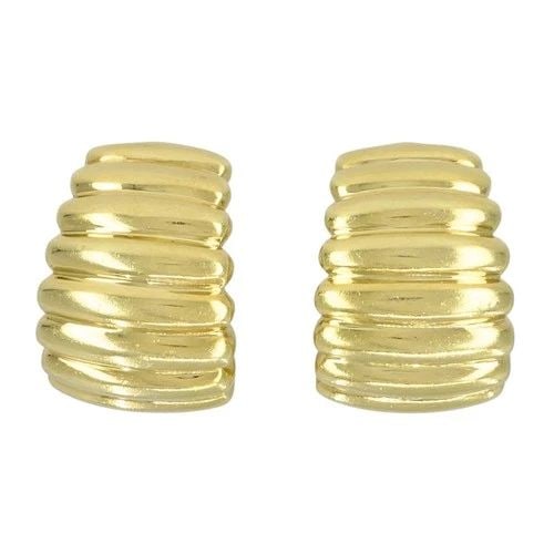VINTAGE TIFFANY & CO. 18K YELLOW GOLD RIBBED HUGGIE EARRINGS: VINTAGE TIFFANY & CO. 18K YELLOW GOLD RIBBED HUGGIE EARRINGS KL TOOO Tiffany & Co. 18k yellow gold ribbed huggie earrings, circa 1980s to 1990s, designed with a rounded half hoop form and horizontal r