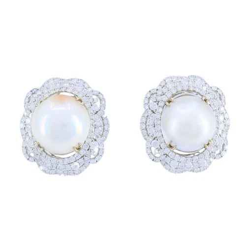 HANA 18K WHITE GOLD MABE PEARL DIAMOND DROP EARRINGS, 2.36 CARATS: HANA 18K WHITE GOLD MABE PEARL DIAMOND DROP EARRINGS, 2.36 CARATS KL NTOO These 18 karat white gold diamond and mabe pearl earrings present a dimensional, sculptural design centered around luminous do