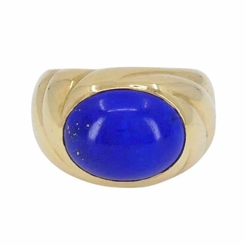 VINTAGE VAN CLEEF & ARPELS 18K GOLD LAPIS LAZULI RING: VINTAGE VAN CLEEF & ARPELS 18K GOLD LAPIS LAZULI RING KL NTOO This Van Cleef & Arpels ring is a late 1970s to early 1980s creation, showcasing the house’s signature approach to bold color and sculpt