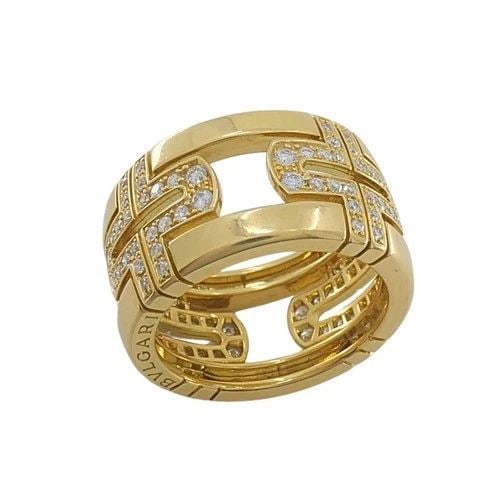 BVLGARI BULGARI 18K GOLD PARENTESI DIAMOND BAND RING: BVLGARI BULGARI 18K GOLD PARENTESI DIAMOND BAND RING DESIGNER Bvlgari CIRCA Late 20th Century MATERIALS 18k Gold GEMSTONE Diamond WEIGHT 9.3 Grams MEASUREMENTS 7/16” RING SIZE 6.75 (not resizabl