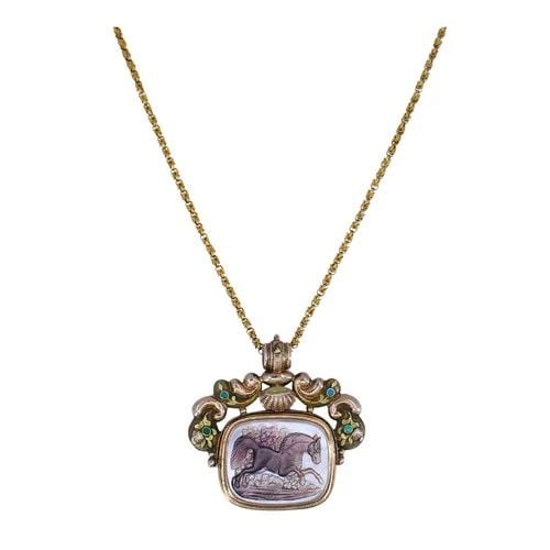 ANTIQUE VICTORIAN GOLD MOTHER OF PEARL EQUESTRIAN PENDANT CHAIN NECKLACE: ANTIQUE VICTORIAN GOLD MOTHER OF PEARL EQUESTRIAN PENDANT CHAIN NECKLACE This antique pendant necklace combines intricate artistry with substantial gold weight, making it both a wearable jewel and a c