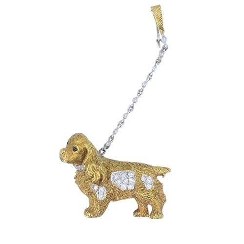 VINTAGE ASPREY LONDON 18K GOLD DIAMOND SAPPHIRE COCKER SPANIEL DOG BROOCH: VINTAGE ASPREY LONDON 18K GOLD DIAMOND SAPPHIRE COCKER SPANIEL DOG BROOCH KL AIOO This Asprey dog brooch is crafted in 18K gold and designed with finely detailed fur texture, diamond accents, and expr