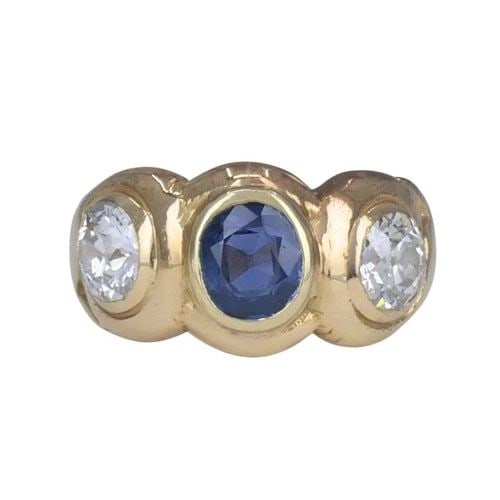 ANTIQUE 14K GOLD SAPPHIRE OLD EUROPEAN CUT DIAMOND THREE STONE RING: ANTIQUE 14K GOLD SAPPHIRE OLD EUROPEAN CUT DIAMOND THREE STONE RING KL AAOO Antique 14k yellow gold sapphire and old European cut diamond ring, circa 1900, designed with a round blue sapphire set at t