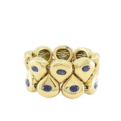 CHAUMET PARIS TSOUKA 18K GOLD FLEXIBLE SAPPHIRE TEARDROP RING: CHAUMET PARIS TSOUKA 18K GOLD FLEXIBLE SAPPHIRE TEARDROP RING DESIGNER Chaumet, Paris CIRCA 1990’s MATERIALS 18k Gold GEMSTONE Sapphire WEIGHT 14.6 Grams RING SIZE 6.5 - 6.75 HALLMARKS Chaumet, Pari