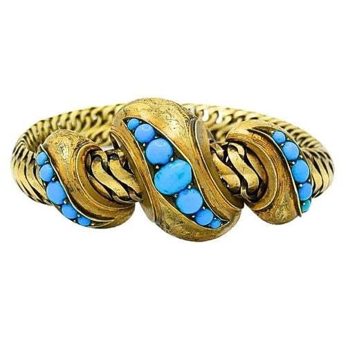 ANTIQUE SNAKE BRACELET TURQUOISE 10K GOLD: ANTIQUE SNAKE BRACELET TURQUOISE 10K GOLD Product details: DESIGNER: Unknown CIRCA: Mid-20th Century MATERIALS: 10k Gold GEMSTONE: Turquoise WEIGHT: 30 Grams MEASUREMENTS: 7 3/8" x 3/8” Top Wide