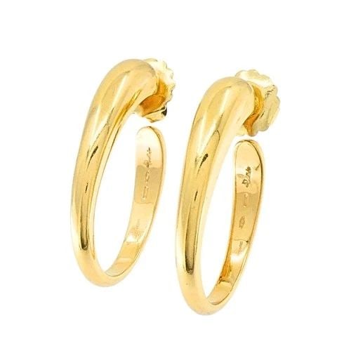 POMELLATO 18K YELLOW GOLD SCULPTURAL HOOP EARRINGS: POMELLATO 18K YELLOW GOLD SCULPTURAL HOOP EARRINGS Pomellato 18k Yellow Gold Sculptural Hoop Earrings These Pomellato hoop earrings are crafted in 18k yellow gold and showcase a sculptural design with