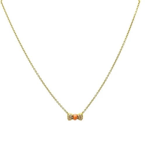VAN CLEEF & ARPELS NECKLACE 18K GOLD CORAL DIAMOND BOW PENDANT: VAN CLEEF & ARPELS NECKLACE 18K GOLD CORAL DIAMOND BOW PENDANT DESIGNER: Van Cleef & Arpels CIRCA: 1980’s MATERIALS: 18k Yellow Gold GEMSTONE: Coral, Round Brilliant Cut Diamond WEIGHT: 5.6 grams ME