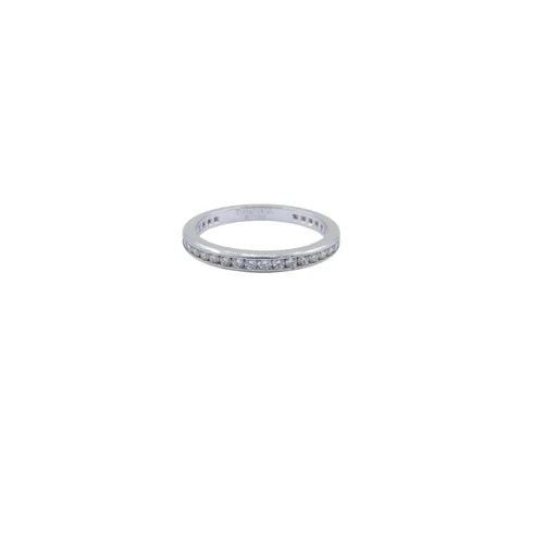 VINTAGE TIFFANY & CO. DIAMOND ETERNITY BAND PLATINUM SIZE 6: VINTAGE TIFFANY & CO. DIAMOND ETERNITY BAND PLATINUM SIZE 6 This vintage Tiffany & Co. eternity band ring is crafted in platinum and set with a single row of round brilliant cut diamonds. The design f