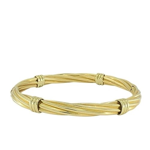 BALESTRA GOLD BRACELET 14K VINTAGE JEWELRY: BALESTRA GOLD BRACELET 14K VINTAGE JEWELRY DESIGNER: Balestra CIRCA: Late 20th Century MATERIALS: 14k Gold WEIGHT: 19 Grams MEASUREMENTS: Inner circumference 7” x 1/4" HALLMARKS: 585, Italy ITEM