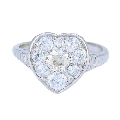 VINTAGE ART DECO DIAMOND HEART CLUSTER RING 10K GOLD PLATINUM: VINTAGE ART DECO DIAMOND HEART CLUSTER RING 10K GOLD PLATINUM KL JOOO This vintage Art Deco diamond heart cluster ring is crafted with a 10k white gold band and a platinum diamond setting, a construct