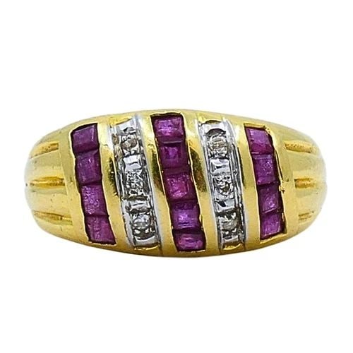 VINTAGE DOME RING 18K GOLD FRENCH DIAMOND RUBY: DESIGNER: Unknown CIRCA: 1980’s MATERIALS: 18k Yellow Gold GEMSTONE: Diamond & Ruby WEIGHT: 6.5 Grams MEASUREMENTS: 3/8" x 9/16" RING SIZE: 6.25 HALLMARKS: French Gold Mark ITEM DETAILS: Vintage Dom