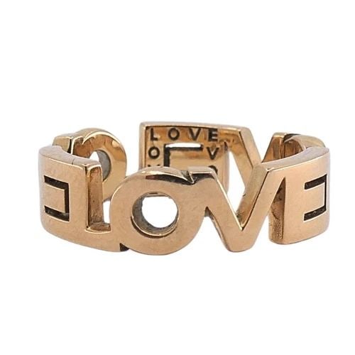 14K GOLD VINTAGE LOVE RING: 14K GOLD VINTAGE LOVE RING Product details: DESIGNER: Unknown CIRCA: Late 20th Century MATERIALS: 14k Gold WEIGHT: 6.3 Grams MEASUREMENTS: 1/4" RING SIZE: 7 HALLMARKS: Love ITEM DETAILS: 14k Gold Vint