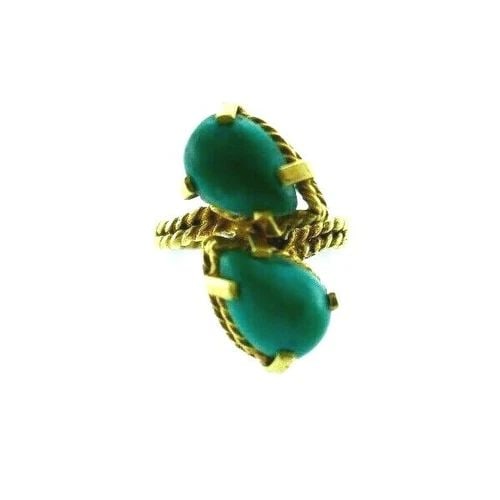 VINTAGE 14K YELLOW GOLD & TURQUOISE BYPASS RING: VINTAGE 14K YELLOW GOLD & TURQUOISE BYPASS RING Vintage 14k Yellow Gold & Turquoise Bypass Ring This is a must for a collector. The weight is 3.8 grams. The height is 3/4 of an inch. The width of band