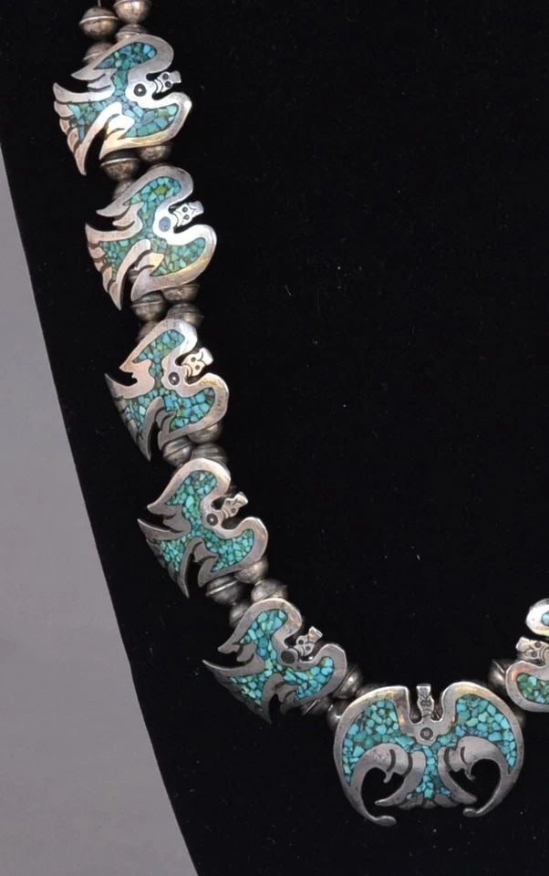 RARE VTG NAVAJO STERLING NECKLACE - TURQUOISE ,CORAL WATER PHOENIX BIRDS - 27.": RARE VTG NAVAJO STERLING NECKLACE - TURQUOISE ,CORAL WATER PHOENIX BIRDS - 27." This rare vintage Navajo Sterling Silver necklace has 11 turquoise coral Water birds (sometimes referred to as Phoenix o