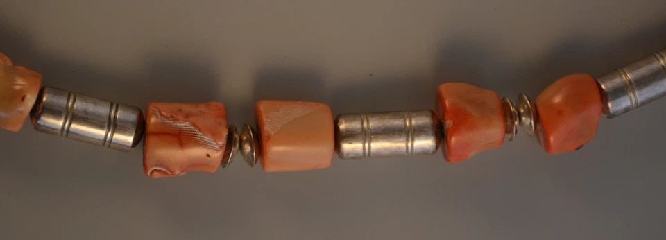 HUGE STRIKING VINTAGE NAVAJO NECKLACE - 40" LONG - LG. CORAL AND SILVER BEADS: HUGE STRIKING VINTAGE NAVAJO NECKLACE - 40" LONG - LG. CORAL AND SILVER BEADS Item Description: This vintage necklace is 40" long and strung with a combination of large coral nuggets and varied sizes 