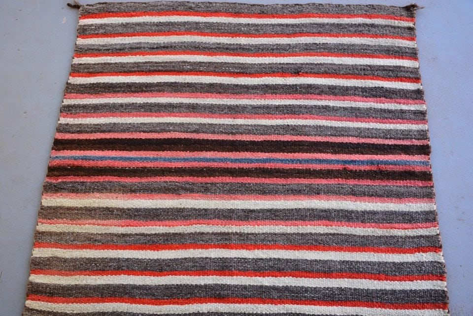 OLD NAVAJO CHILD'S / SADDLE BLANKET - STRIPED, SOFT WOOLS - CIRCA. 1900 (1 of 2)
