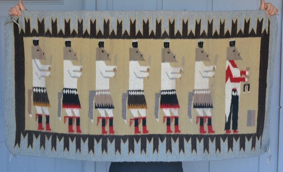 VINTAGE NAVAJO PICTORIAL YEI BI CHEI RUG - 7 FOX DANCERS - - 54.5" X 29.5": This vintage Navajo pictorial rug shows 7 Yei figures. It has been nicely woven and is in very good vintage condition. It measures 54 1/2" x 29 1/2". The Fox Yei Dancers wear fox skins or fox tails at