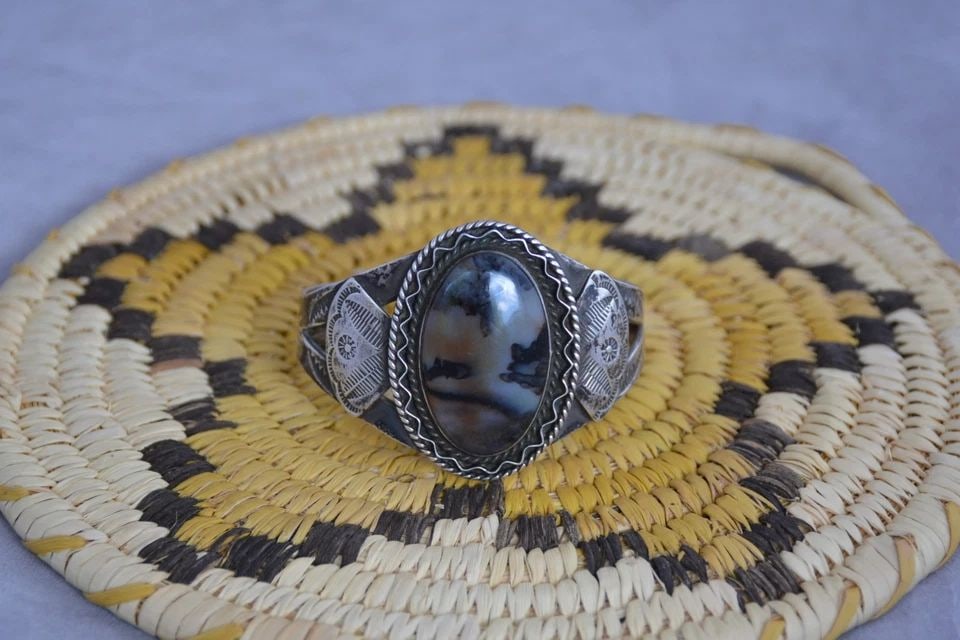 OLD PAWN NAVAJO SILVER HANDSTAMPED BRACELET PETRIFIED WOOD STONE - 6 3/8": This old pawn Navajo sterling silver bracelet has been intricately handstamped and set with a beautifully polished Petrified wood stone. The front of the bracelet is 1 3/4" tall. The bracelet size is 