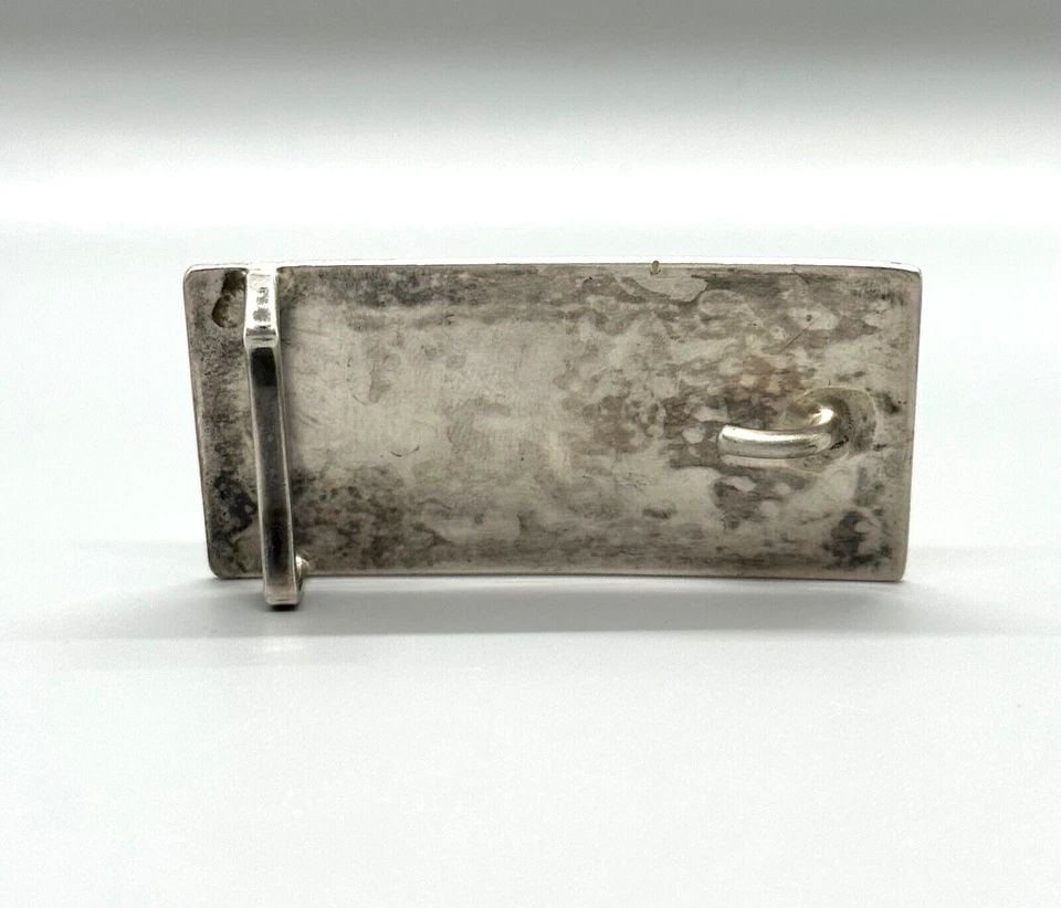 OLD PAWN UNUSUAL NAVAJO STERLING SILVER HAND STAMPED BELT BUCKLE: OLD PAWN UNUSUAL NAVAJO STERLING SILVER HAND STAMPED BELT BUCKLE Item Description: 1 1/8 " Tall x 2 1/2" Wide Weight 1 oz.