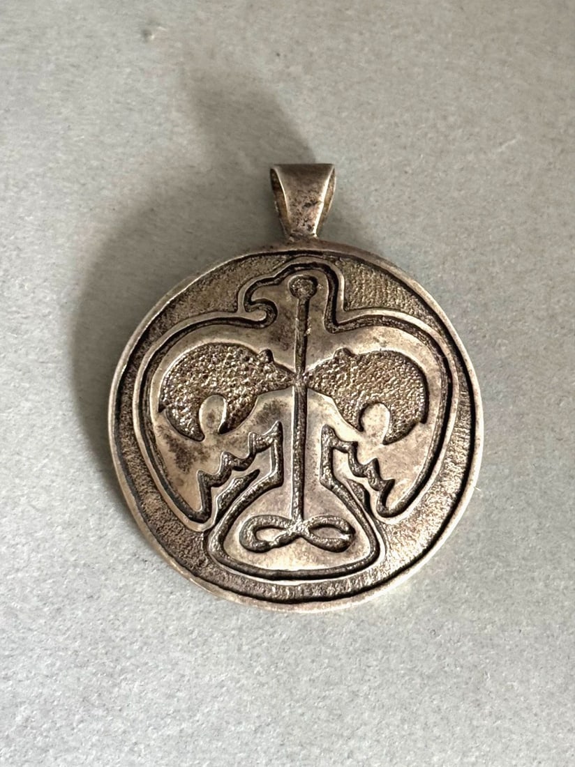 OLD PAWN NAVAJO TUFA CAST SILVER EAGLE AND BEARS PENDANT 1 3/4" TALL: Old Pawn Navajo Tufa Cast Silver Eagle and Bears Pendant ..1 3/4" Tall ..16.7 Grams Throughout the 40 years that I have been in business, I have purchased jewelry from pawn shops throughout the Southw