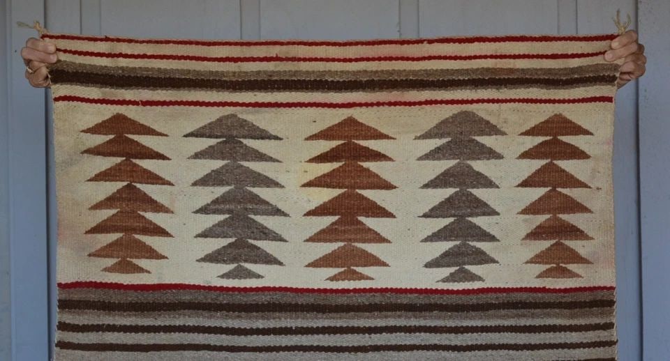 VINTAGE LARGE SADDLE BLANKET NAVAJO RUG - BROWNS GRAY WHITE RED - 35.5" X 35.5": VINTAGE LARGE SADDLE BLANKET NAVAJO RUG - BROWNS GRAY WHITE RED - 35.5" X 35.5" This is a large early Navajo double saddle blanket rug. It measures 35" x 35". This rug has horse sweat stains along the