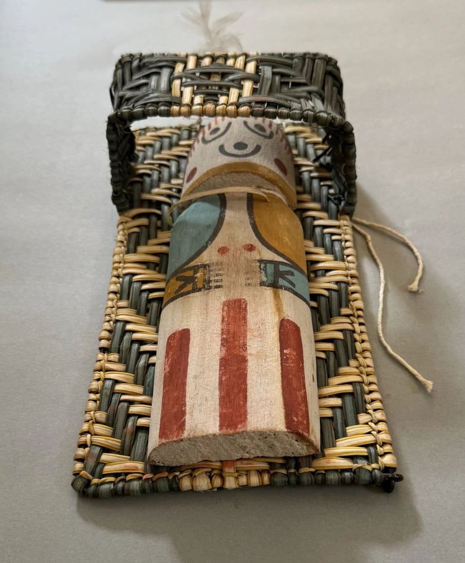 RARE VINTAGE HOPI CRADLE BOARD BASKET WITH DOLL KACHINA: 9 1/2 " Tall ..5 " Wide ..Handmade Cradle Basket with Doll Kachina Throughout the 40 years that I have been in business, I have purchased jewelry from pawn shops throughout the Southwest that had coll