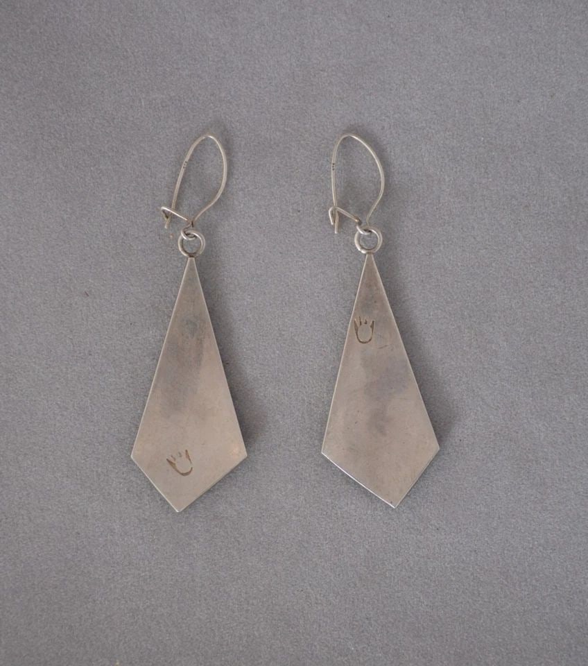 RICKY COOCHWYTEWA - VINTAGE HOPI STERLING SILVER DANGLE EARRINGS - 2 1/8" DROP: RICKY COOCHWYTEWA - VINTAGE HOPI STERLING SILVER DANGLE EARRINGS - 2 1/8" DROP This pair of sterling silver earrings have been beautifully crafted by Hopi silversmith Ricky Coochwytewa. They have a wo