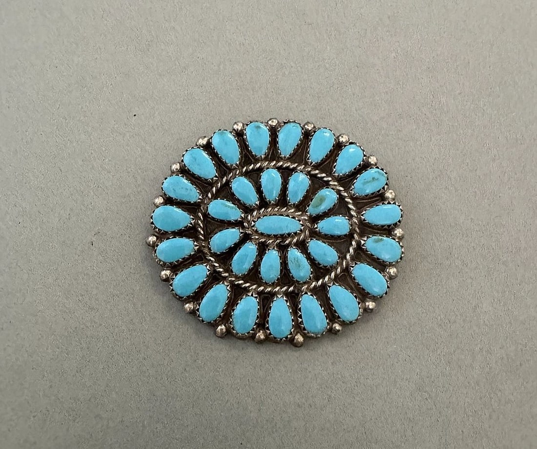 VINTAGE NAVAJO STERLING SILVER AND TURQUOISE PIN SIGNED HB: 1 5/8 " Tall x 1 7/8 " wide 15 Grams Throughout the 40 years that I have been in business, I have purchased jewelry from pawn shops throughout the Southwest that had collections of dead pawn. Most of 