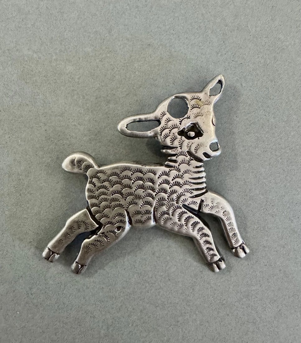 VINTAGE NAVAJO SHEEP , LAMB STERLING SILVER PIN , PENDANT ..: 1 3/4" Tall x 2 1/4" Wide 21 Grams Throughout the 40 years that I have been in business, I have purchased jewelry from pawn shops throughout the Southwest that had collections of dead pawn. Most of th