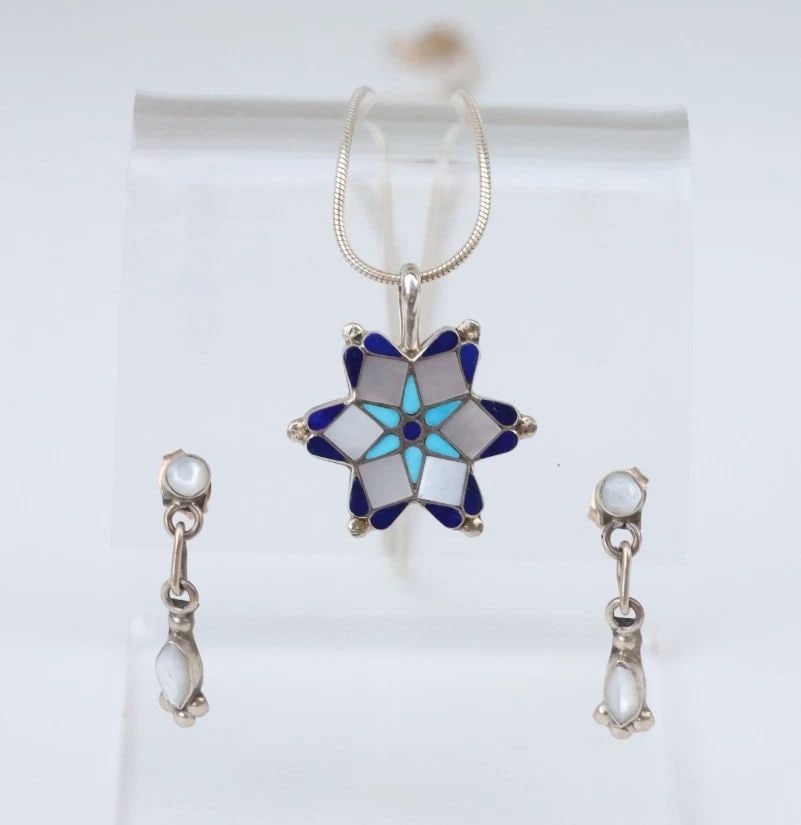 ZUNI SILVER INLAID STAR PENDANT NECKLACE& EARRING SET - FERDINAND & SYLVIA HOOEE: This Zuni sterling silver star pendant necklace has been beautifully inlaid with lapis, mother of pearl shell and turquoise. It comes with delicately crafted dangle drop earrings. This set is in like 