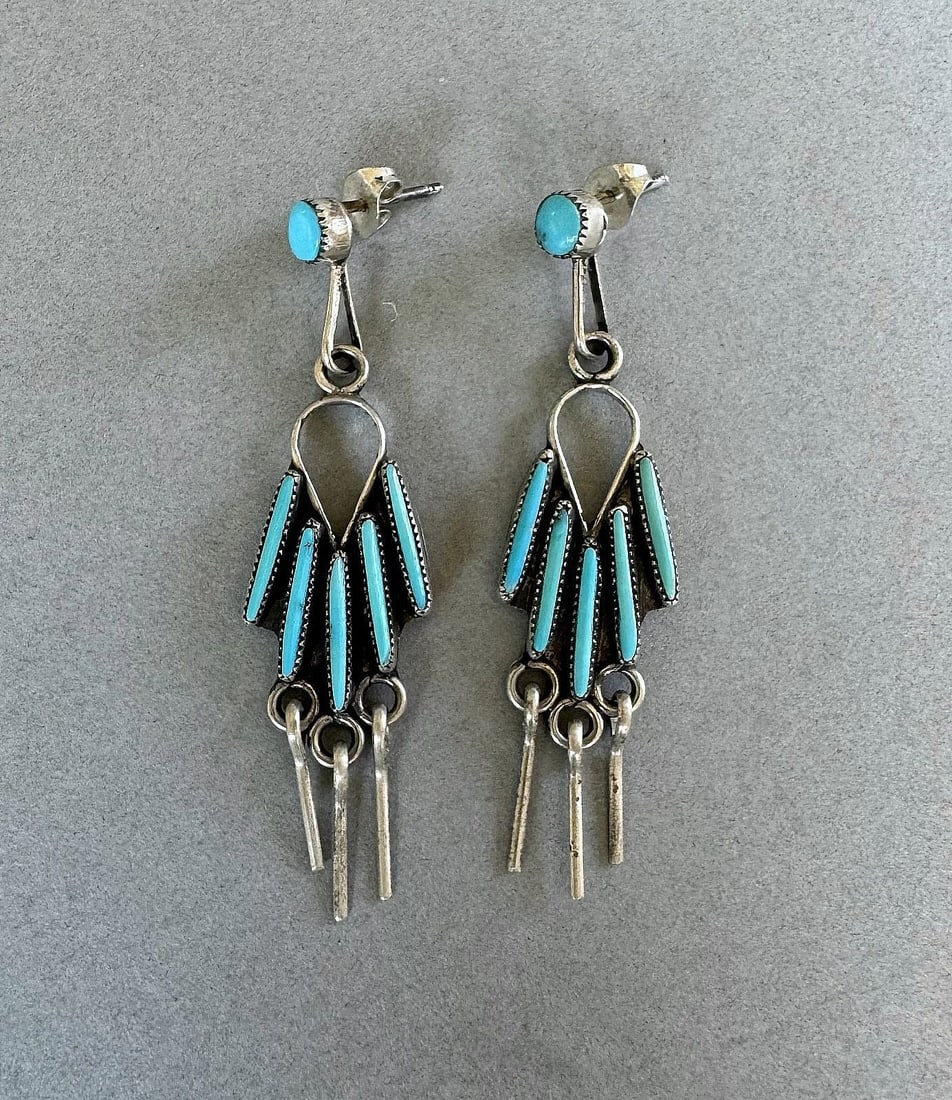 OLD PAWN ZUNI STERLING SILVER AND NEEDLE POINT TURQUOISE EARRINGS 2": 2" tall 4.9 Grams Throughout the 40 years that I have been in business, I have purchased jewelry from pawn shops throughout the Southwest that had collections of dead pawn. Most of these pawn shops an