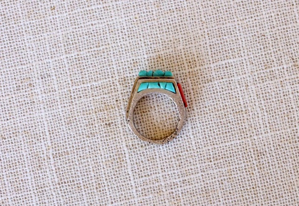 VINTAGE TUFA CAST SILVER TURQUOISE AND CORAL RING SIZE 6 1/4: VINTAGE TUFA CAST SILVER TURQUOISE AND CORAL RING SIZE 6 1/4 7/16" Wide ..11.3 Grams .. size 6 1/4 Throughout the 40 years that I have been in business, I have purchased jewelry from pawn shops throug