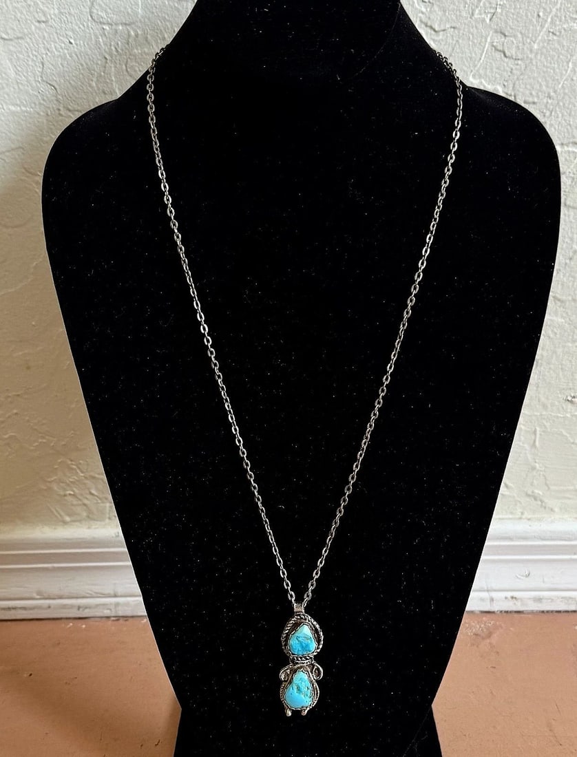 OLD PAWN STERLING SILVER AND TURQUOISE NECKLACE PENDANT: 1 7/8 " Tall x 5/8 " Wide 16 Grams Throughout the 40 years that I have been in business, I have purchased jewelry from pawn shops throughout the Southwest that had collections of dead pawn. Most of th