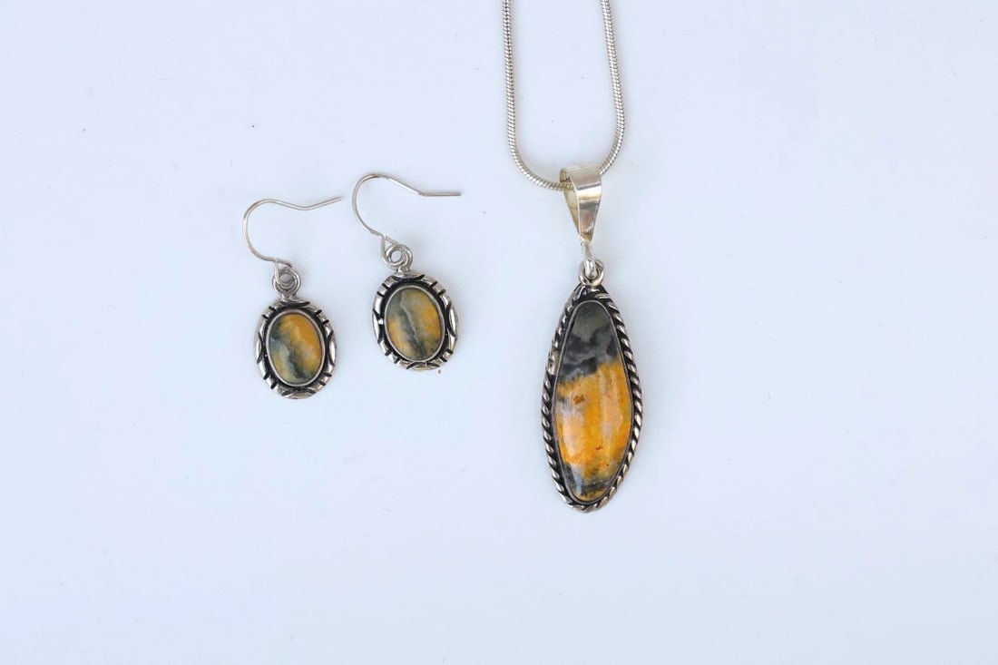 COLORFUL NAVAJO AGATE STERLING SILVER PENDANT NECKLACE AND DANGLE EARRINGS - 16": This Navajo sterling silver pendant and earrings have been set with colorful agate stones. The pendant has been signed with the J hallmark of the artist and marked sterling. The earrings are signed wi