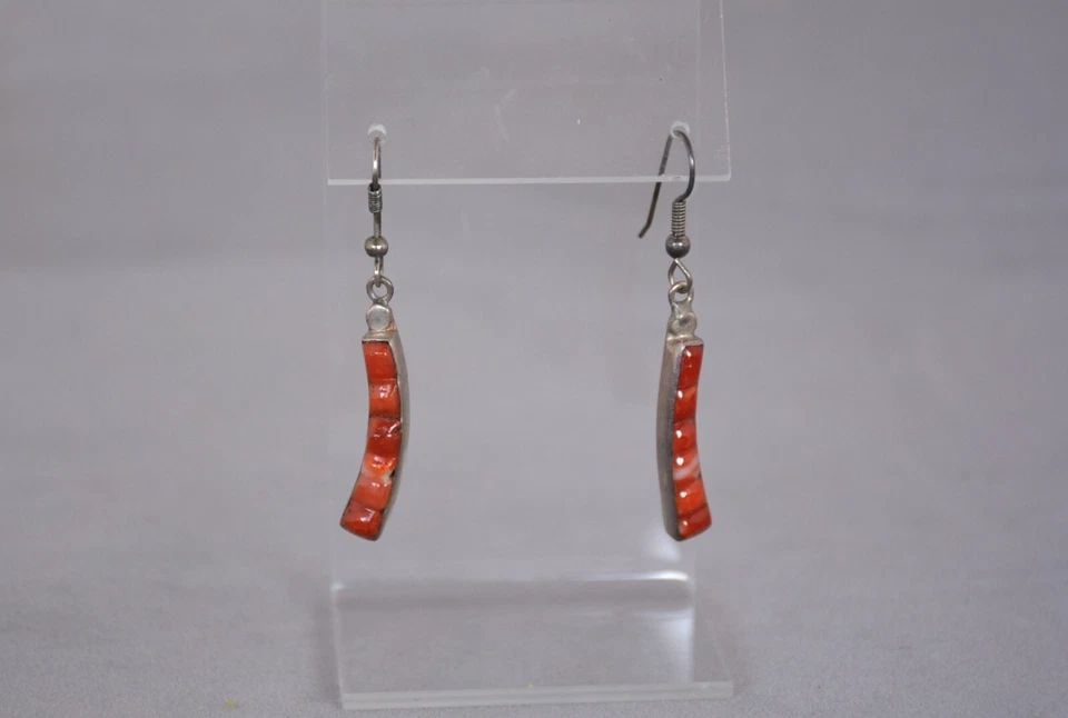 VINTAGE ZUNI STERLING SILVER CHANEL INLAY CORAL EARRINGS - 2" DROP - DANGLES: VINTAGE ZUNI STERLING SILVER CHANEL INLAY CORAL EARRINGS - 2" DROP - DANGLES This lovely pair of Zuni sterling silver earrings have been set with a rich shade of orange coral. The earrings drop 2" fro