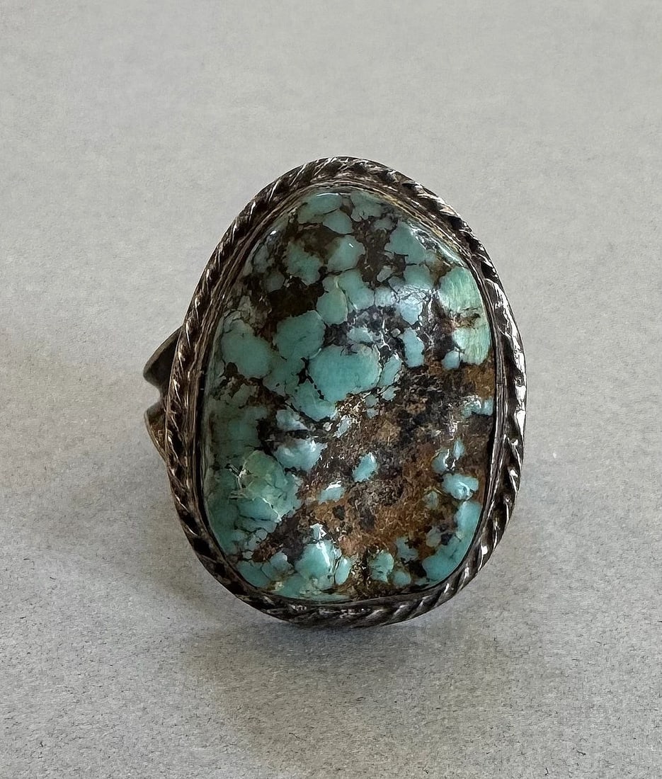 OLD PAWN NAVAJO STERLING SILVER TURQUOISE RING SIZE 8: 1" Tall 9.8 Grams Throughout the 40 years that I have been in business, I have purchased jewelry from pawn shops throughout the Southwest that had collections of dead pawn. Most of these pawn shops an