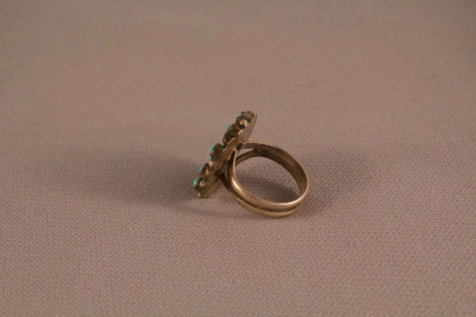 OLD ZUNI SNAKE EYE STERLING AND TURQUOISE RING SIZE 5 1/2: OLD ZUNI SNAKE EYE STERLING AND TURQUOISE RING SIZE 5 1/2 Item Description: 3/4" tall Nice old Zuni Snake Eye Ring