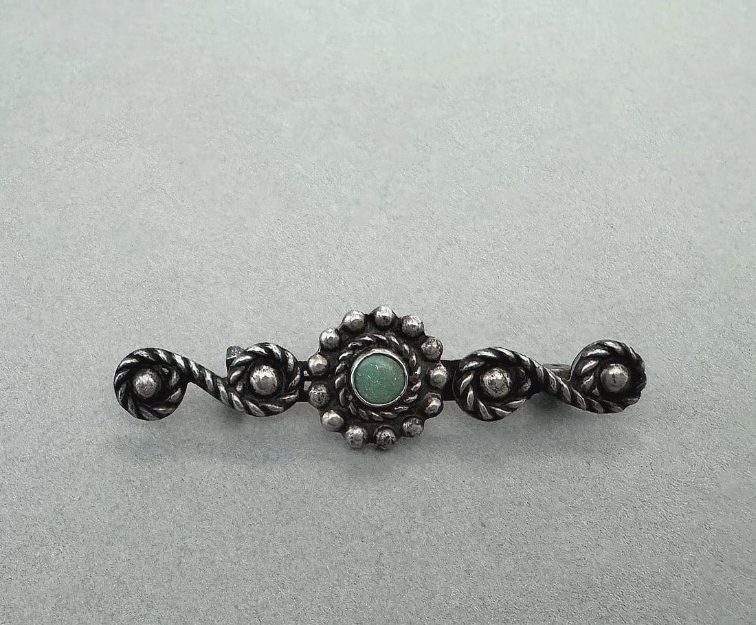 OLD PAWN NAVAJO STERLING SILVER AND TURQUOISE PIN: 5/8 " x 2 1/4 " 6.8 Grams Throughout the 40 years that I have been in business, I have purchased jewelry from pawn shops throughout the Southwest that had collections of dead pawn. Most of these pawn 