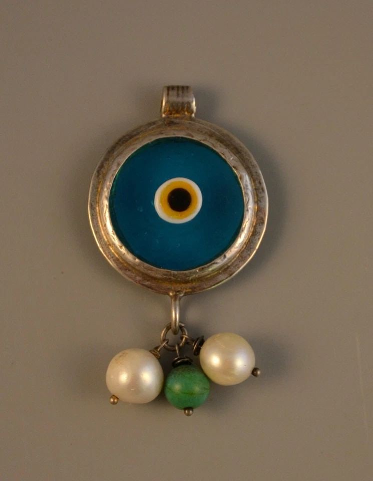 HANDCRAFTED STERLING TURQUOISE AMULET PENDANT PEARLS - EVIL EYE PROTECTION LUCK: HANDCRAFTED STERLING TURQUOISE AMULET PENDANT PEARLS - EVIL EYE PROTECTION LUCK Item Description: This amulet pendant has been handcrafted of sterling silver with turquoise glass at the center. The ye