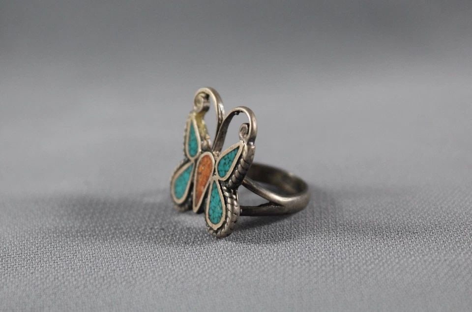 OLD PAWN NAVAJO TURQUOISE AND CORAL BUTTERFLY RING SIZE 5: OLD PAWN NAVAJO TURQUOISE AND CORAL BUTTERFLY RING SIZE 5 Item Description: 7/8” tall