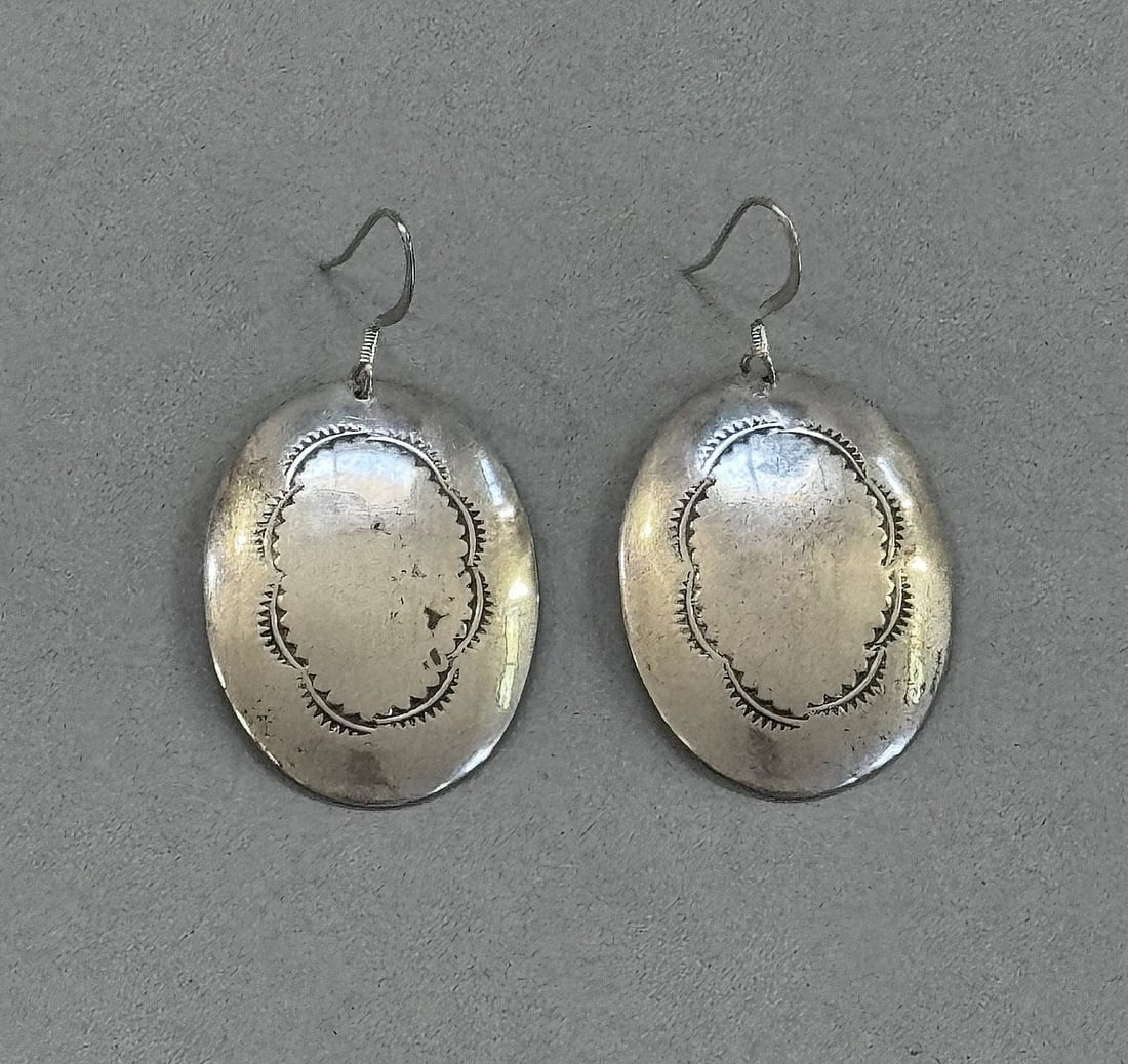 VINTAGE NAVAJO STERLING SILVER EARRINGS 1 7/8 " DROP: 1 7/8 " Drop ...1" wide Throughout the 40 years that I have been in business, I have purchased jewelry from pawn shops throughout the Southwest that had collections of dead pawn. Most of these pawn sh