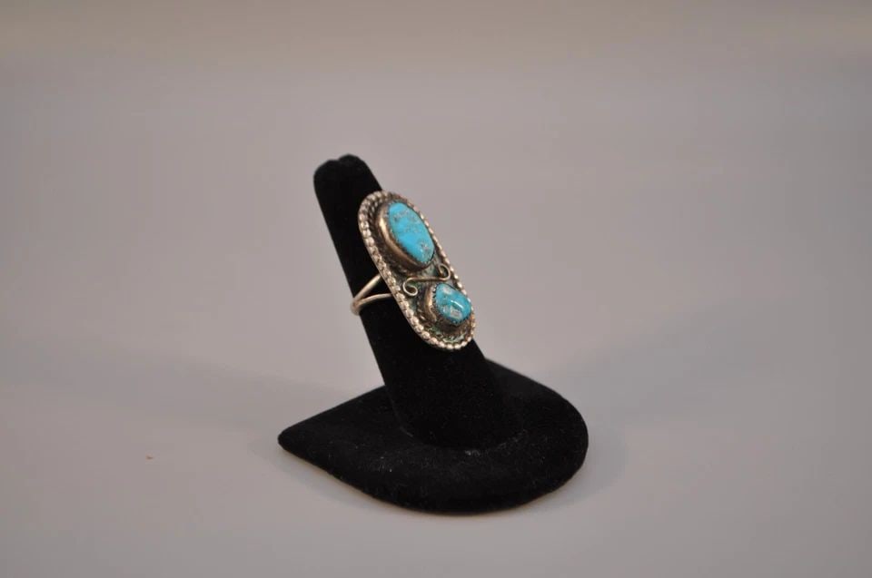 OLD PAWN NAVAJO STERLING SILVER RING - TURQUOISE SIZE 6: OLD PAWN NAVAJO STERLING SILVER RING - TURQUOISE SIZE 6 Weight 9.49 Grams 1 1/2 " Tall Old Pawn Jewelry dates from the early 1900s to the 1970s. Most of it is not signed because it wasn't the Native A