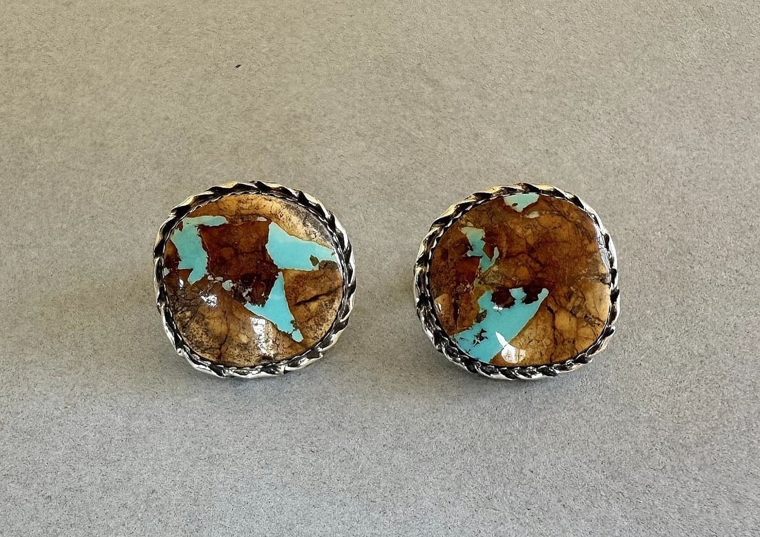 VINTAGE NAVAJO STERLING SILVER AND TURQUOISE EARRINGS 3/4 ": 3/4 " Wide 9.4 Grams Throughout the 40 years that I have been in business, I have purchased jewelry from pawn shops throughout the Southwest that had collections of dead pawn. Most of these pawn shops