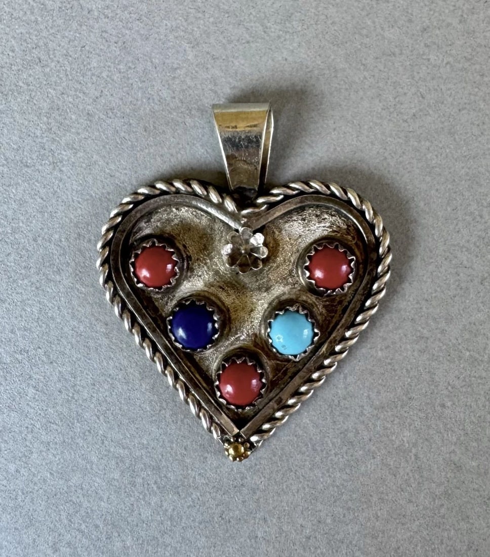 VINTAGE NAVAJO STERLING SILVER AND STONES HEART PENDANT: 1 1/2" Tall 1 1/4" Wide Signed A 5.2 Grams Throughout the 40 years that I have been in business, I have purchased jewelry from pawn shops throughout the Southwest that had collections of dead pawn. Mo